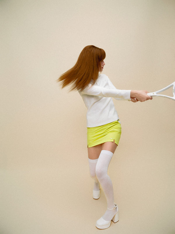 Poshy Dynamic Golf Miniskirt| Kiwi
